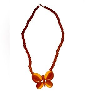 1970s wooden butterfly necklace.